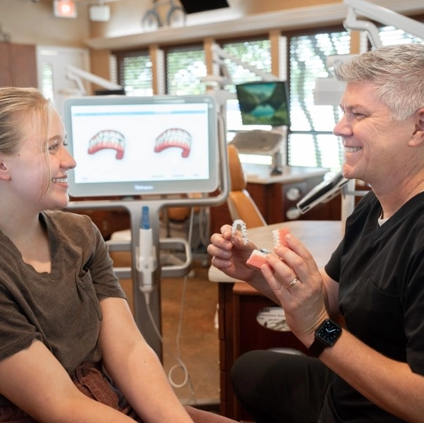 Dr. Cramer with a braces patient in Krum